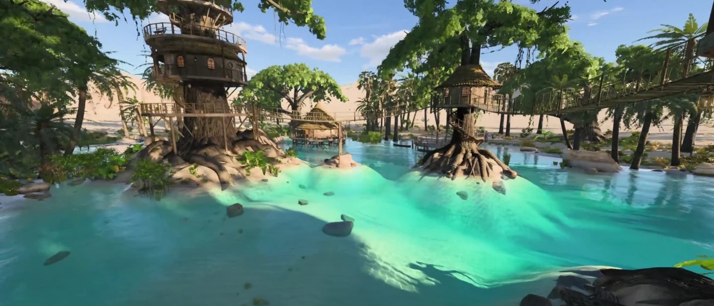 Round treehouses and rope bridges stand above the clear turquoise lagoon.